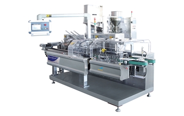 Flexible tube packing machine